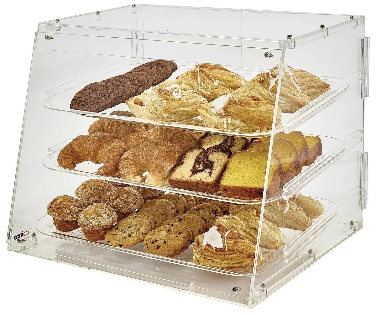 Vitrina exhibidora acrílica de tres niveles con galletas, croissants, muffins y pasteles variados