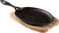 Tabla de cortar ovalada de hierro fundido Tramontina Mix Grill con base y mango de madera mixta, 38,5 x 19 cm