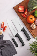 Cuchillo para carne Tramontina Professional Master de 8" con hoja de acero inoxidable y mango de polipropileno negro.24609/008