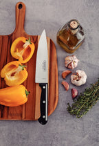 Cuchillo de chef Tramontina Ultracorte con hoja de acero inoxidable y mango de polipropileno negro, 7"